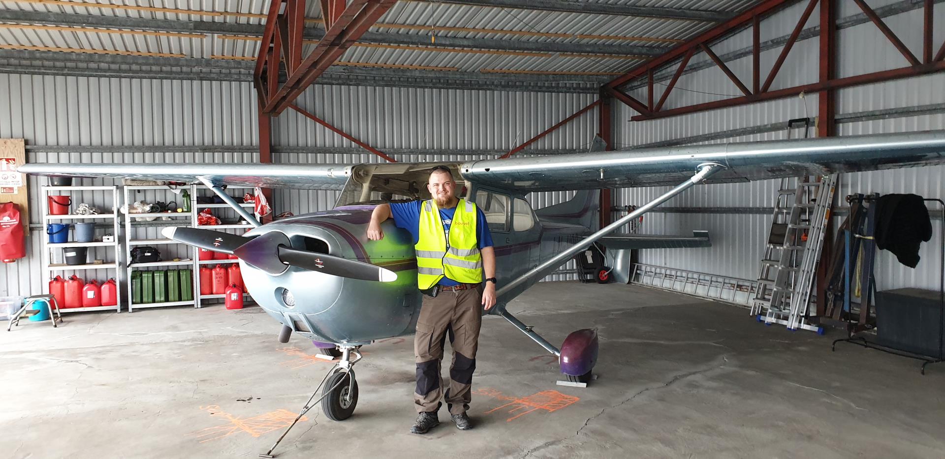 Happy student in the hangar